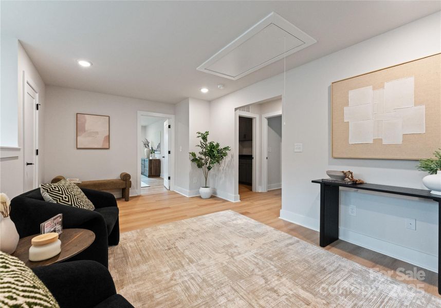 Furnished interior in a model home at Matthews Ridge Reserve in Matthews (Image 7).