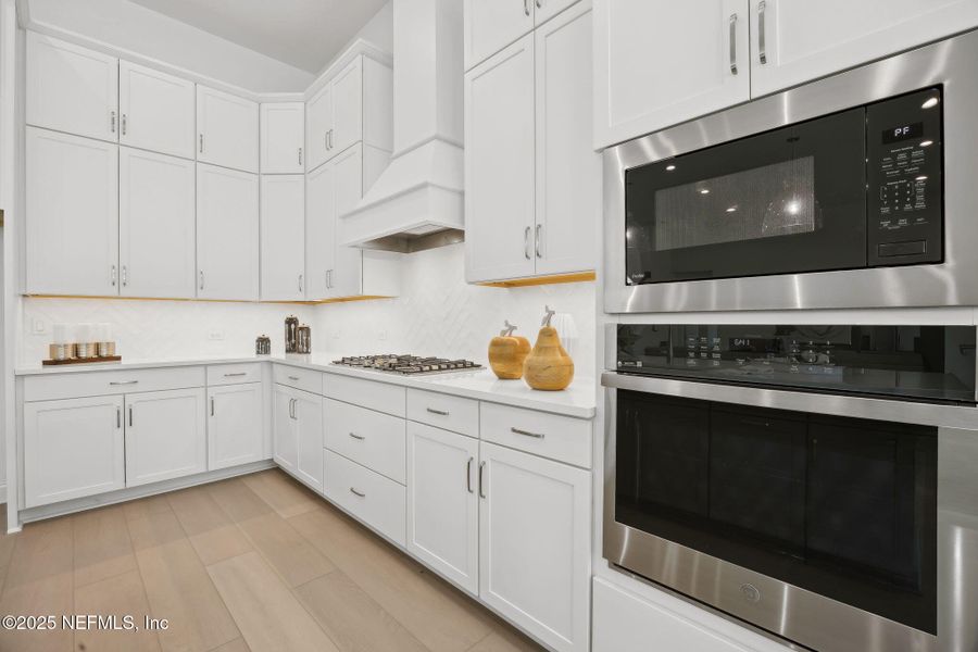 Furnished interior view inside a new home in Amelia National, Fernandina Beach (Image 13).