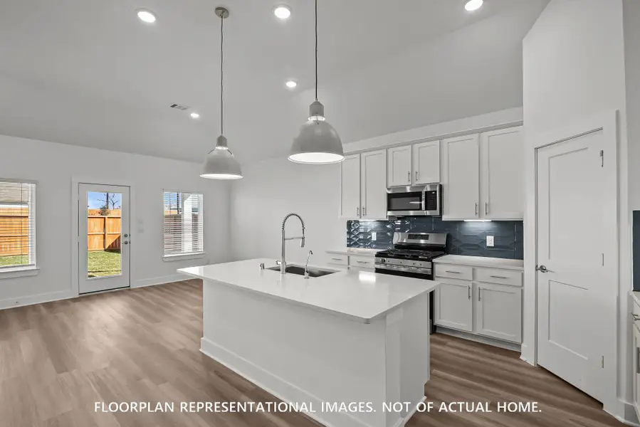 Furnished interior view inside a new home in Sorella, Tomball (Image 9).