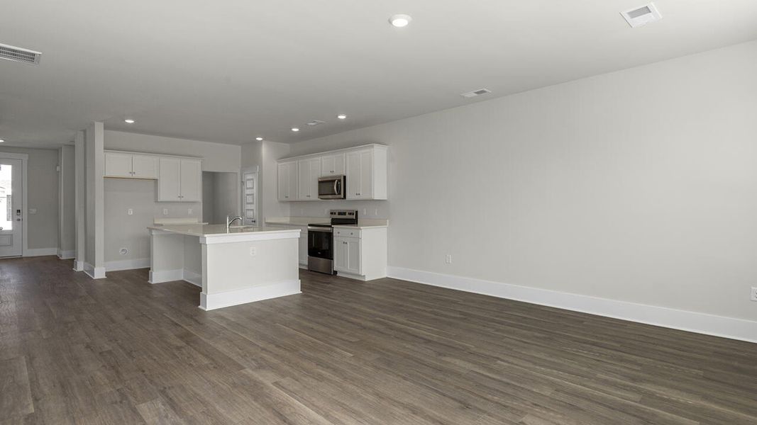 Spacious, unfurnished interior of a new home in Surfside Landing, Hubert (Image 18).