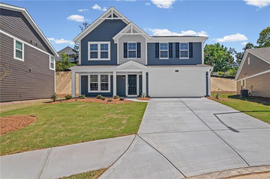 Front exterior of a new home in Sage Woods, Dallas, GA, highlighting curb appeal (Image 21).