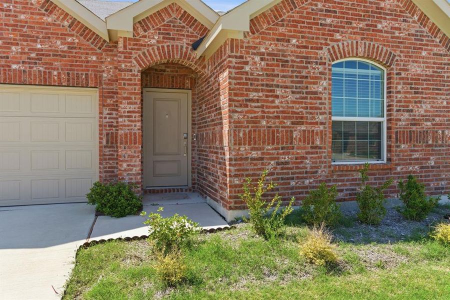 Exterior details and patio area of a home in Reatta Ridge, Justin (Image 21).