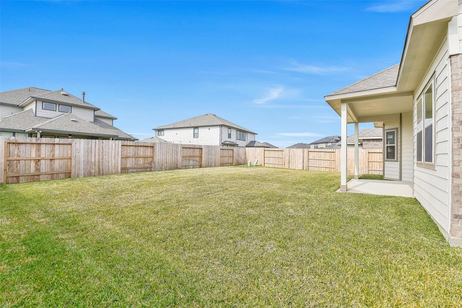 Exterior details and patio area of a home in Stone Creek Ranch, Hockley (Image 23).