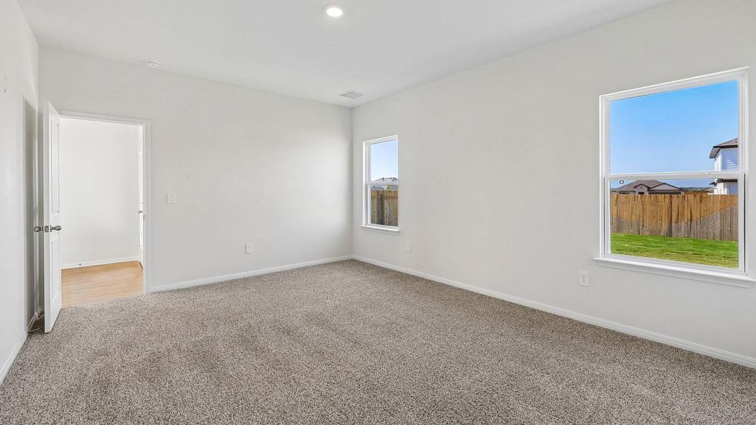 Spacious, unfurnished interior of a new home in Carillon, Manor (Image 24).