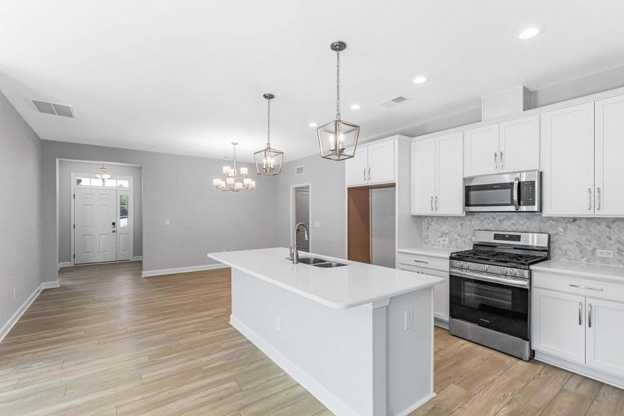Representative furnished interior of a home built from the Weymouth by Caviness & Cates Communities in Bartlett Manor, Youngsville (Image 129).