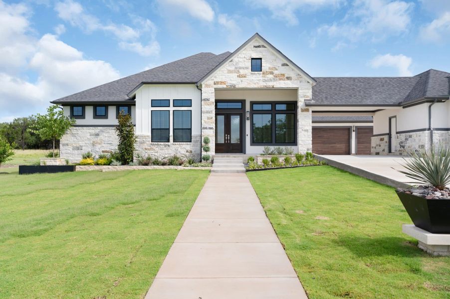 Front exterior of a new home in Feathergrass, Florence, TX, highlighting curb appeal (Image 29).