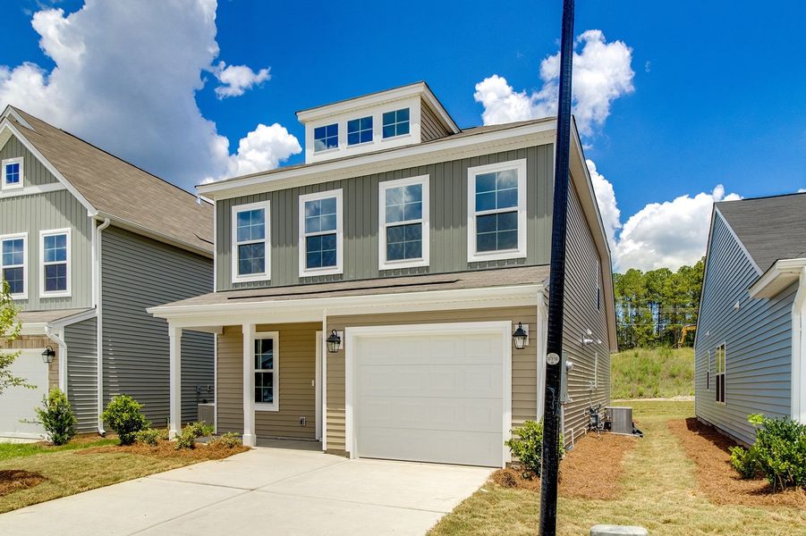 Front exterior of a new home in Bluefield, Lexington, SC, highlighting curb appeal (Image 2). Front exterior of a new home in Bluefield, Lexington, SC, highlighting curb appeal (Image 2).