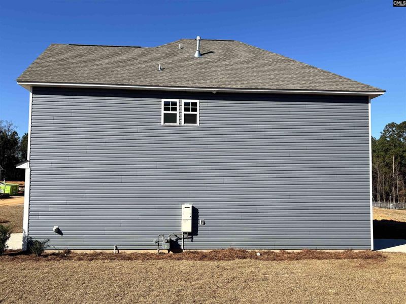 Exterior details and patio area of a home in Rolling Hills, Prosperity (Image 3). Exterior details and patio area of a home in Rolling Hills, Prosperity (Image 3).