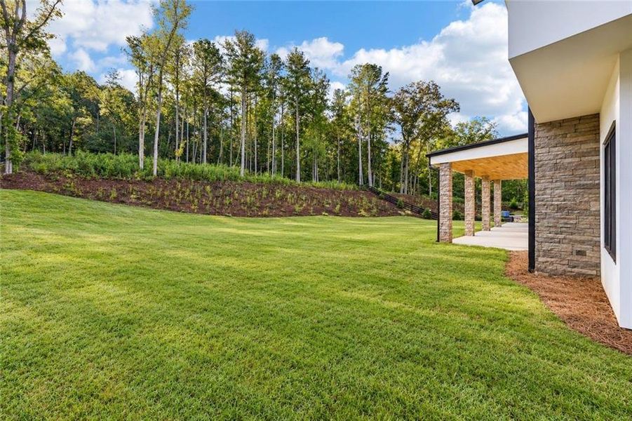 Exterior details and patio area of a home in , Hoschton (Image 28).