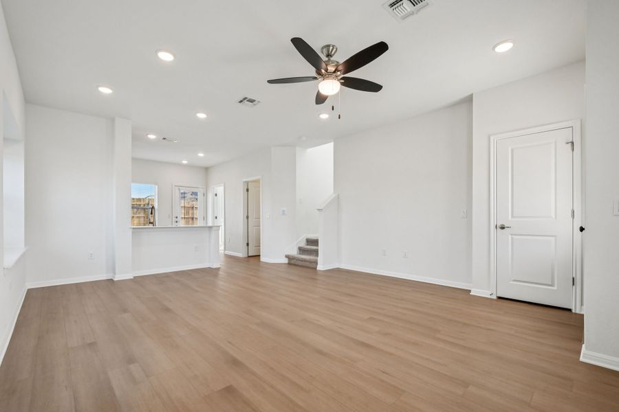 Spacious, unfurnished interior of a new home in Whisper Valley, Manor (Image 22).