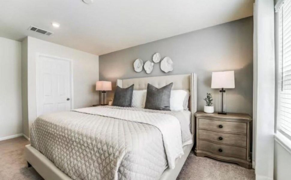 Furnished interior view inside a new home in The Pines At Seven Coves, Conroe (Image 5).
