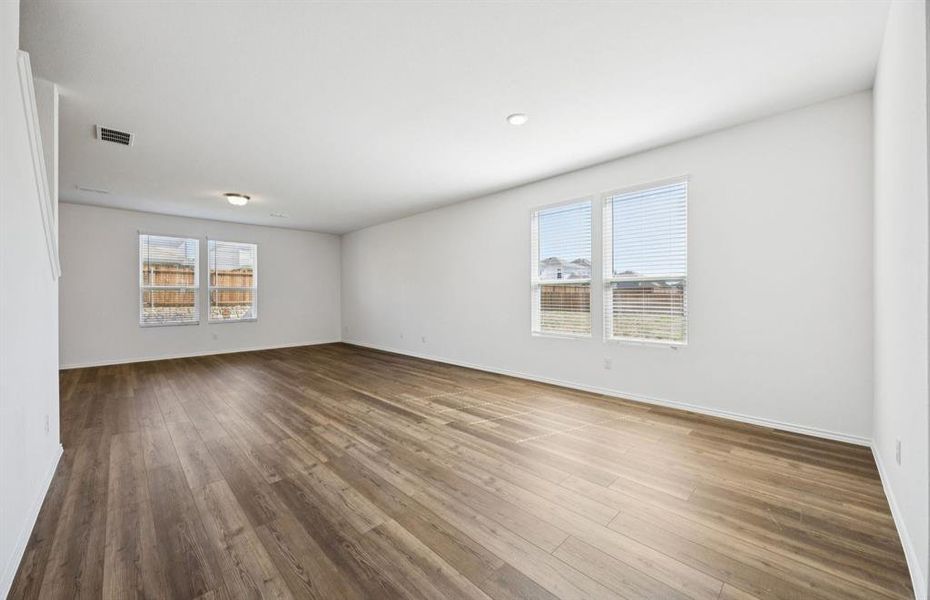 Spacious gathering room with large windows