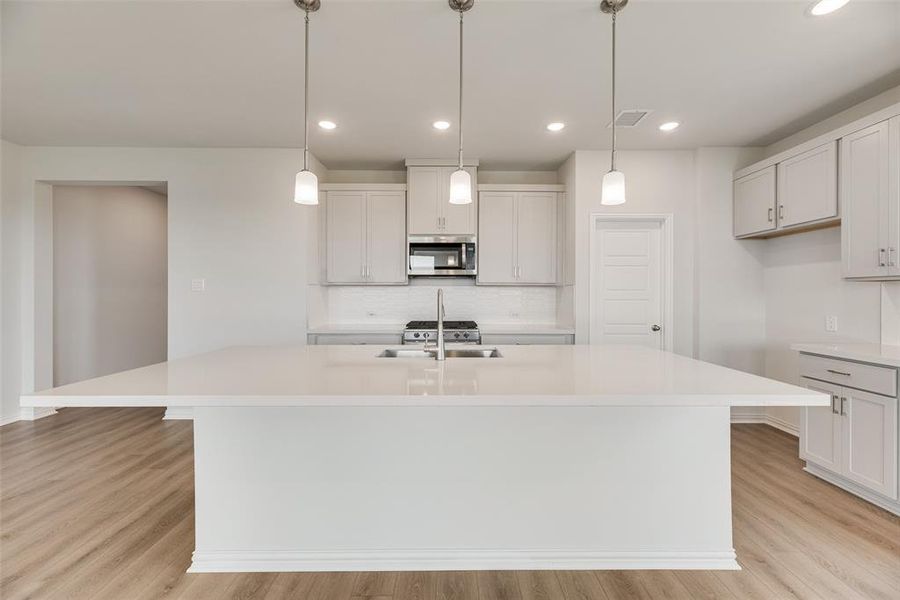 Furnished interior view inside a new home in Spiritas Ranch, Little Elm (Image 8). Furnished interior view inside a new home in Spiritas Ranch, Little Elm (Image 8).