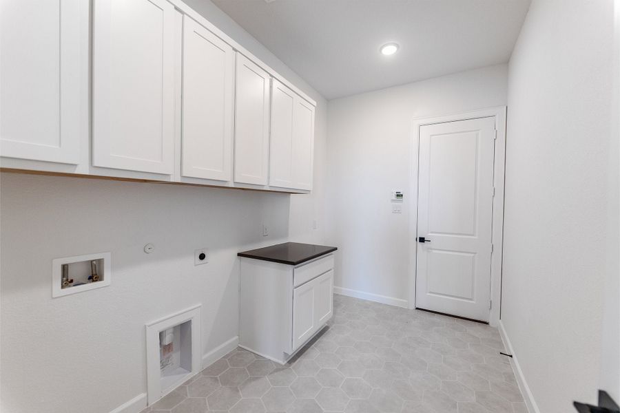 Furnished interior view inside a new home in Green Meadows, Celina (Image 13).