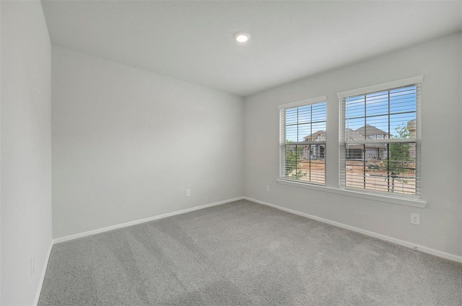 Spacious, unfurnished interior of a new home in Woodstone, Providence Village (Image 37).