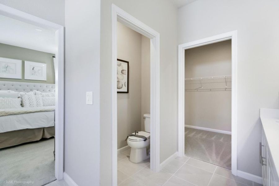 Primary bathroom and walk-in closet