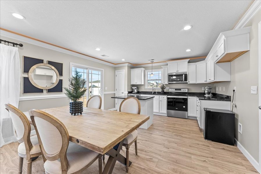 Representative furnished interior of a home built from the Sumter by Enchanted Homes in Lonesome Dove, San Antonio (Image 16).