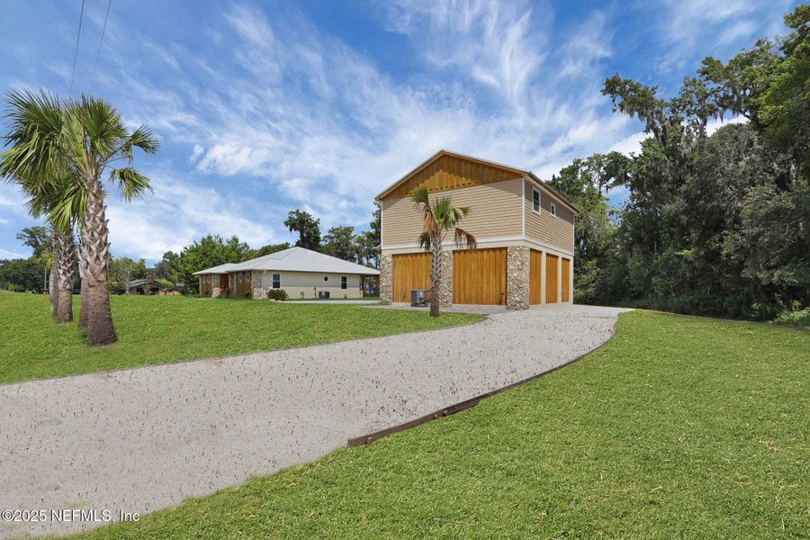 Front exterior of a new home in , East Palatka, FL, highlighting curb appeal (Image 51). Front exterior of a new home in , East Palatka, FL, highlighting curb appeal (Image 51).