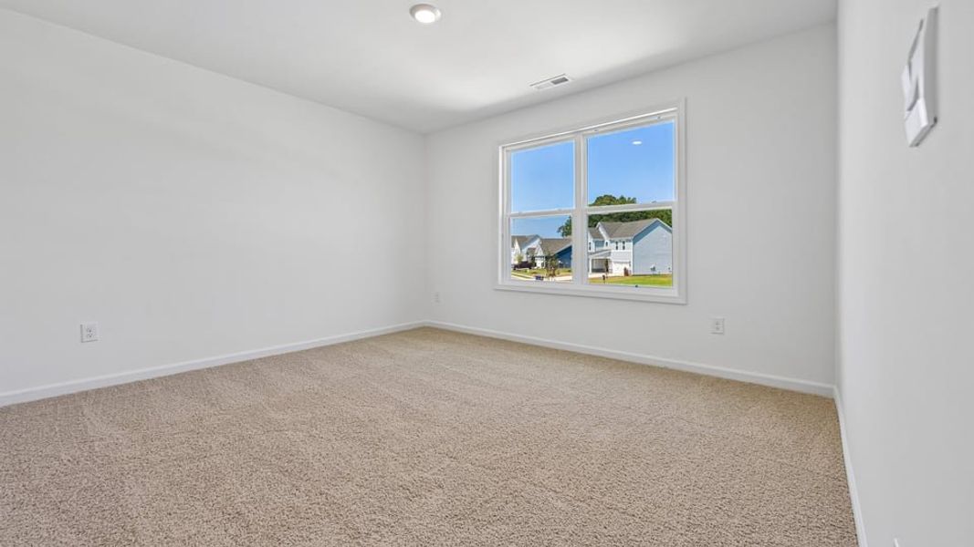 Spacious, unfurnished interior of a new home in Eagle Creek, Fuquay Varina (Image 29).