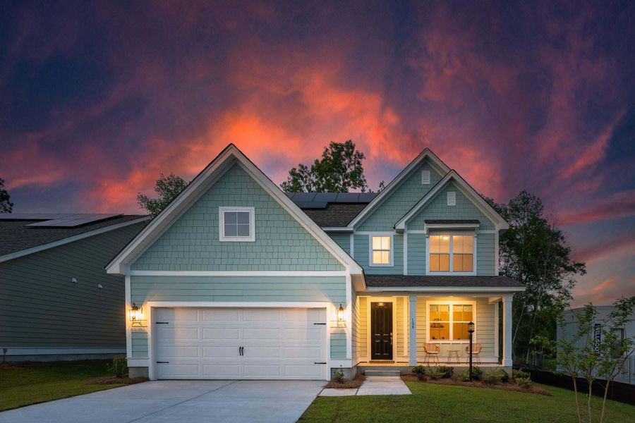 Front exterior of a new home in High Point at Foxbank, Moncks Corner, SC, highlighting curb appeal (Image 1).