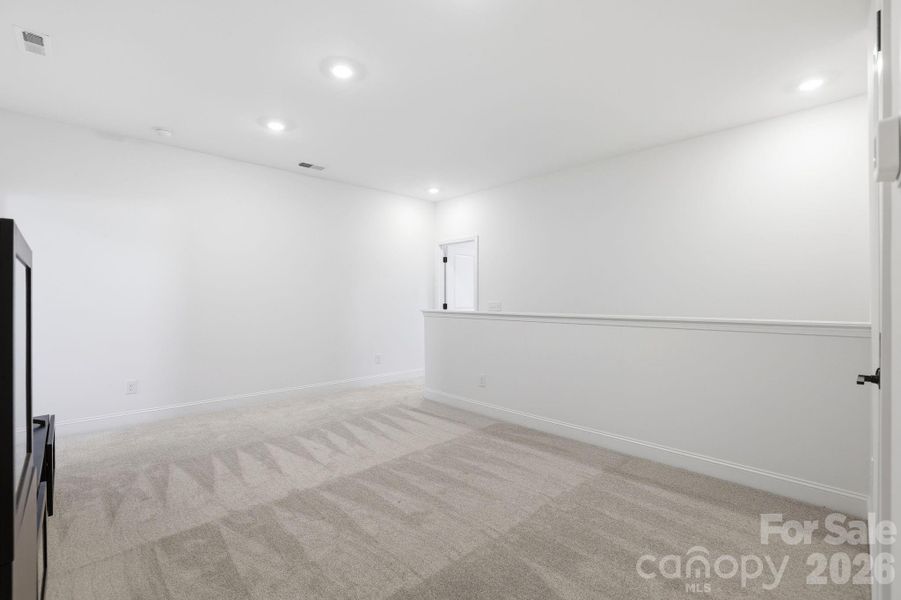 Spacious, unfurnished interior of a new home in Estates at Sugar Creek, Indian Land (Image 22).