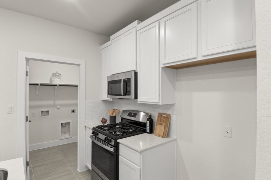 Furnished interior view inside a new home in Saddle Creek Twinhomes, Georgetown (Image 41).