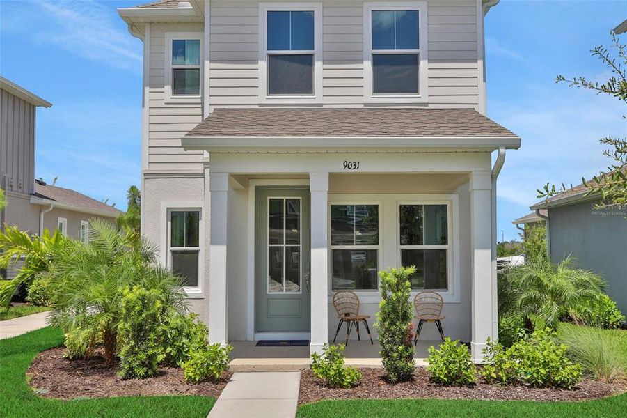 Front exterior of a new home in Bungalow Walk at Lakewood Ranch, Sarasota, FL, highlighting curb appeal (Image 23).