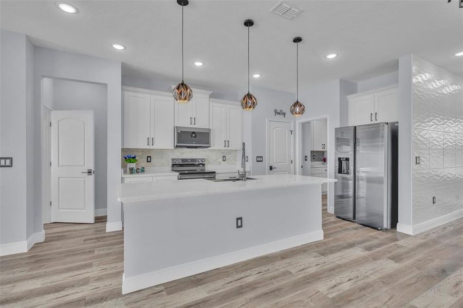 Furnished interior view inside a new home in , Poinciana (Image 10).