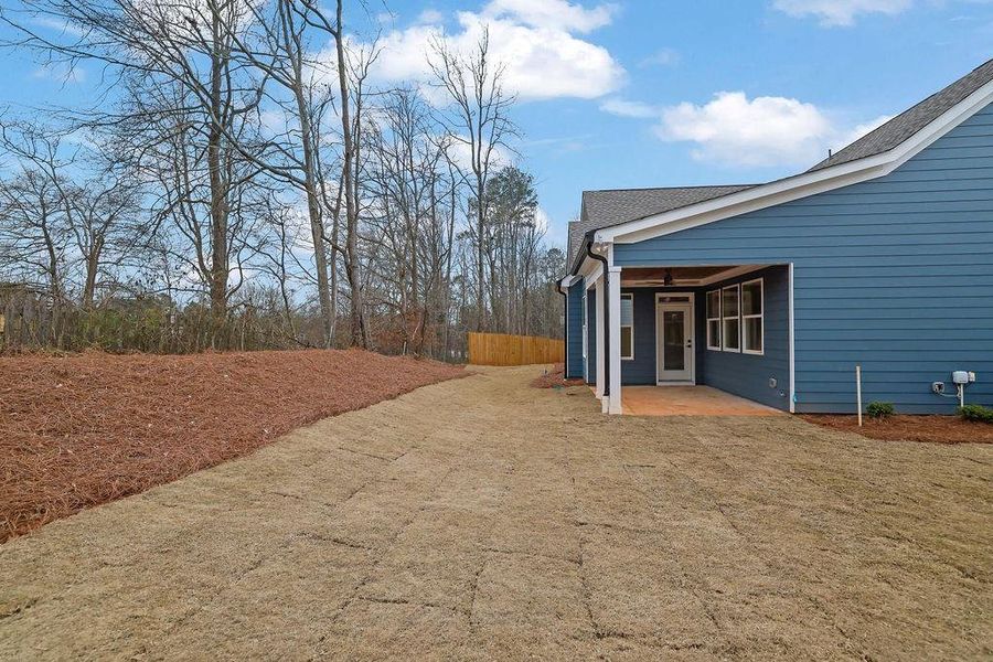 Exterior details and patio area of a home in , Holly Springs (Image 3).