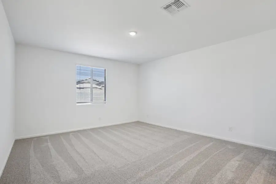 Primary suite - Sanctuary at Stonebridge Model Home. Finishes and options may vary by community