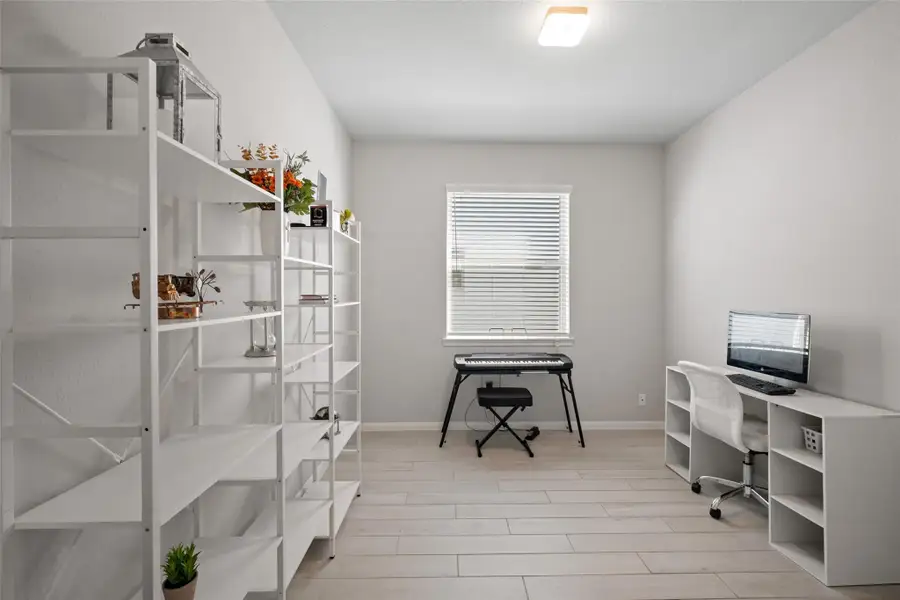 Furnished interior view inside a new home in Waterstone on Lake Conroe, Montgomery (Image 9).