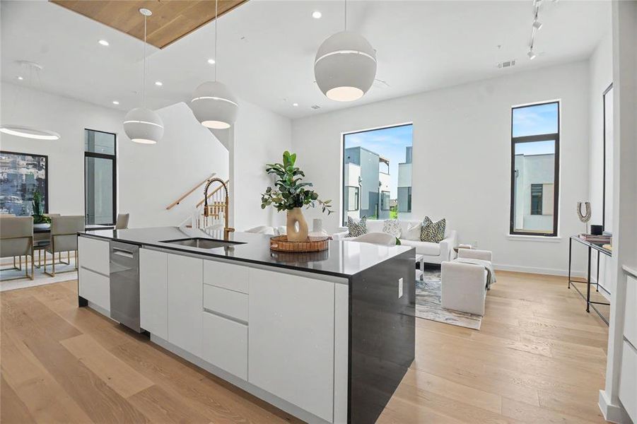 Walk in pantry as well as abundant cabinets throughout.