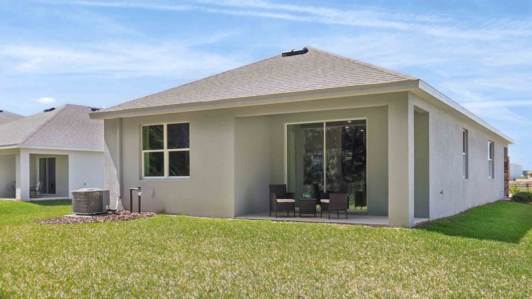Representative exterior photo of a completed home built from the Astor by D.R. Horton in Ocala Preserve, Ocala, FL (Image 16).