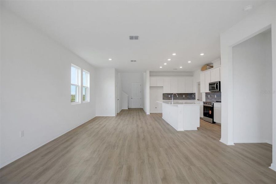 Spacious, unfurnished interior of a new home in Seaire, Parrish (Image 18).