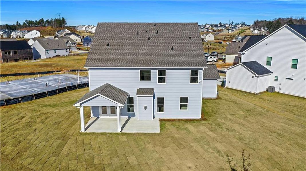Exterior details and patio area of a home in Twin Lakes, Hoschton (Image 34).