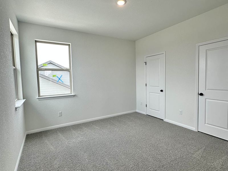 Spacious, unfurnished interior of a new home in Sage Hollow, Kyle (Image 18).