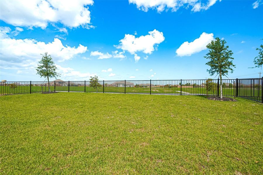Front exterior of a new home in Lago Mar, La Marque, TX, highlighting curb appeal (Image 2).