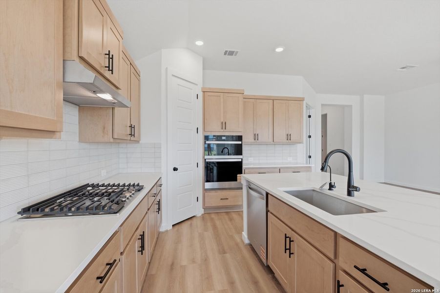 Furnished interior view inside a new home in The Crossvine, Schertz (Image 7).