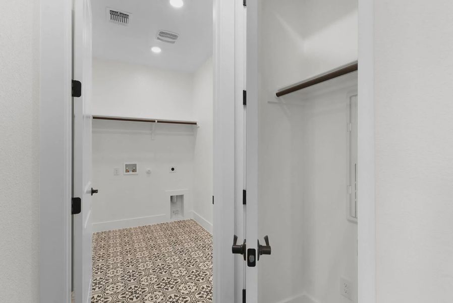 Representative unfurnished interior of a home built from the Brooks by Chesmar Homes in University Heights, McKinney (Image 30).