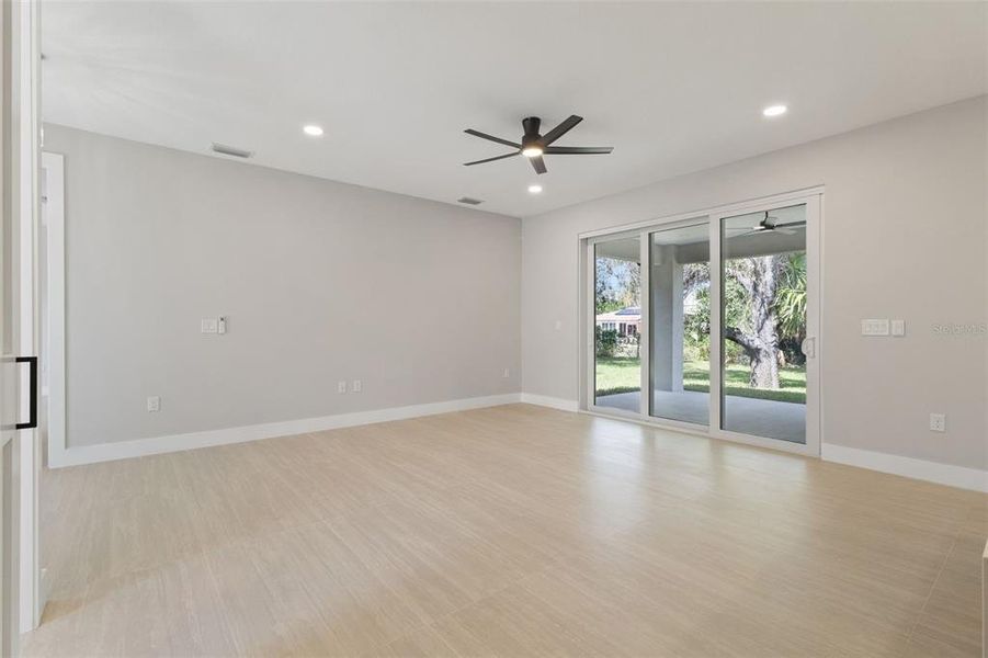 Spacious, unfurnished interior of a new home in , Port Charlotte (Image 40).