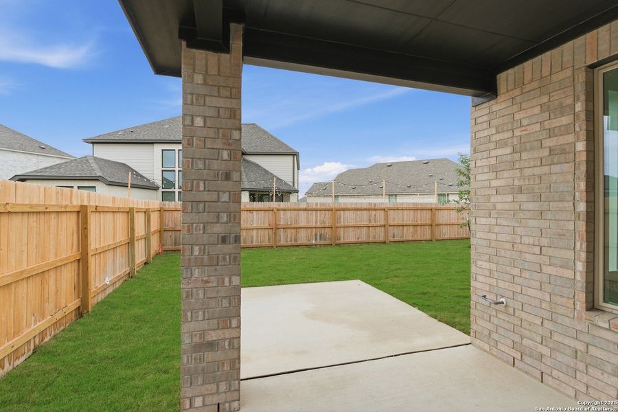 Exterior details and patio area of a home in Alsatian Oaks, Castroville (Image 23).