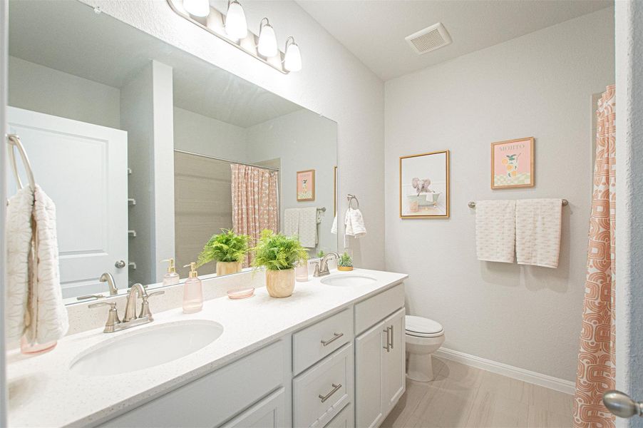 Furnished interior view inside a new home in Sage Hollow, Kyle (Image 25).