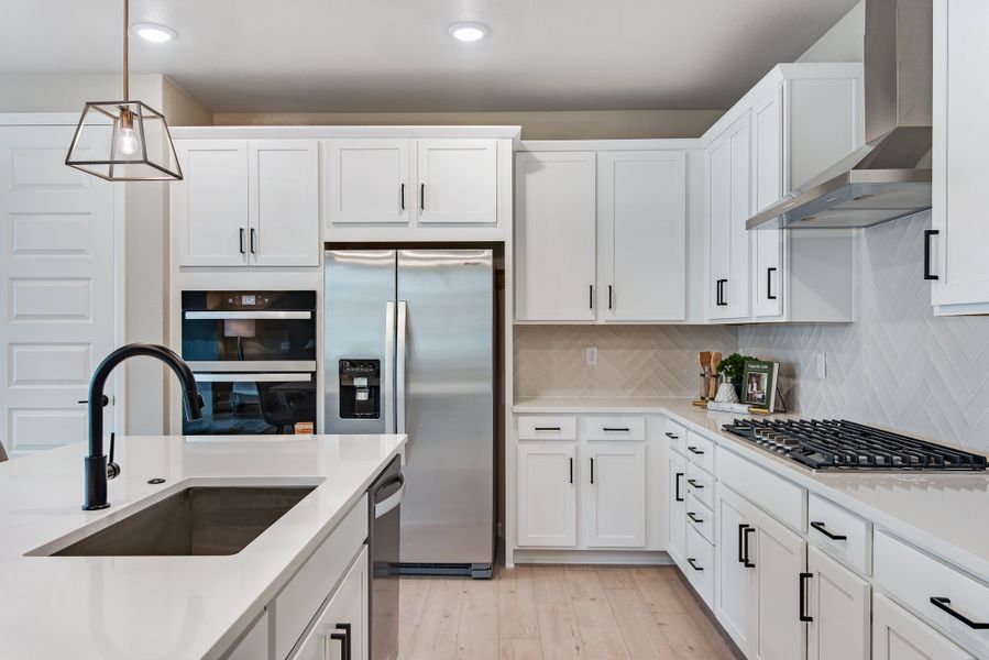 Furnished interior view inside a new home in Reunion, Commerce City (Image 14).