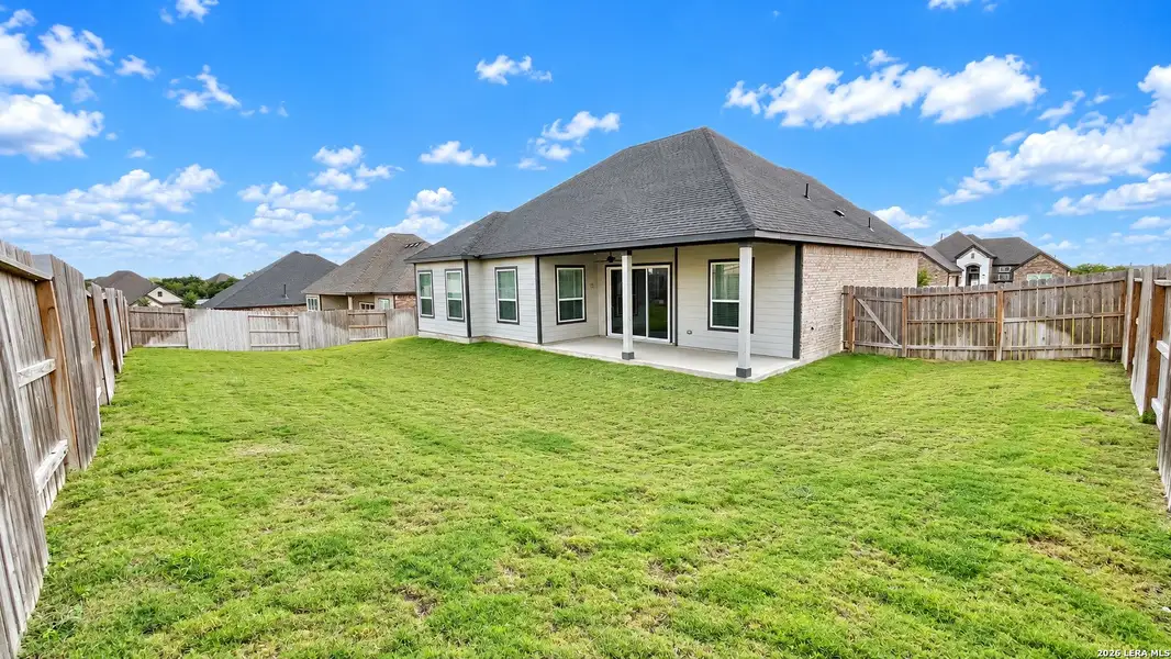 Exterior details and patio area of a home in Potranco West, Castroville (Image 20).