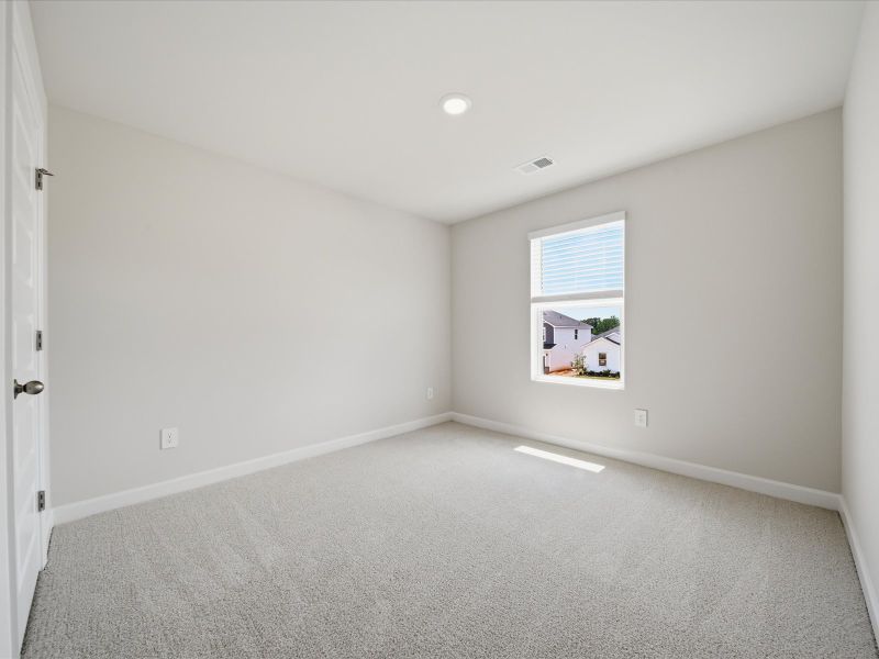 Spacious, unfurnished interior of a new home in The Farm at Wells Creek - Signature Collection, Gray Court (Image 17).