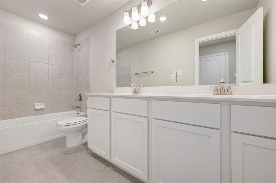 Furnished interior view inside a new home in Lily Creek at Sutton Fields, Aubrey (Image 15).