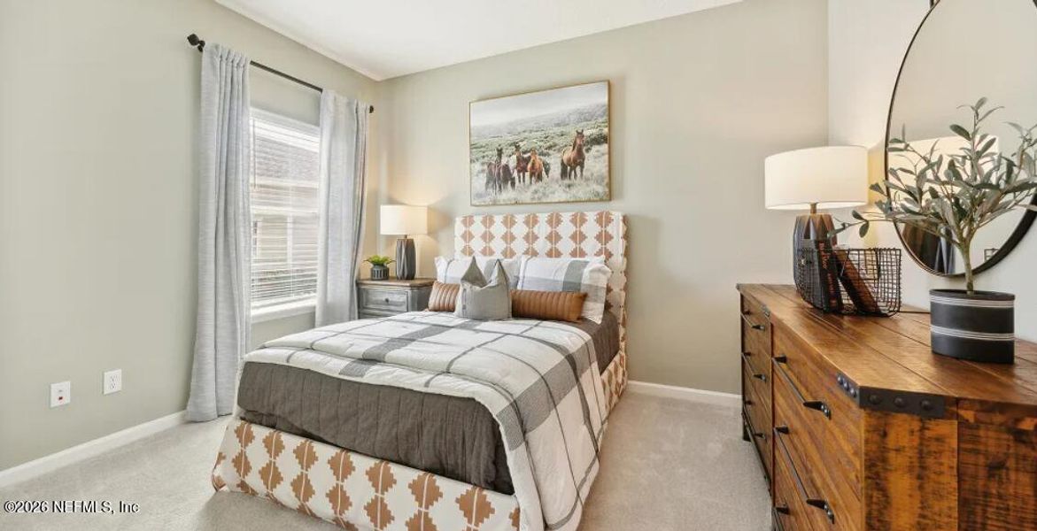 Furnished interior view inside a new home in Silver Falls Single Family at SilverLeaf, St. Augustine (Image 9).