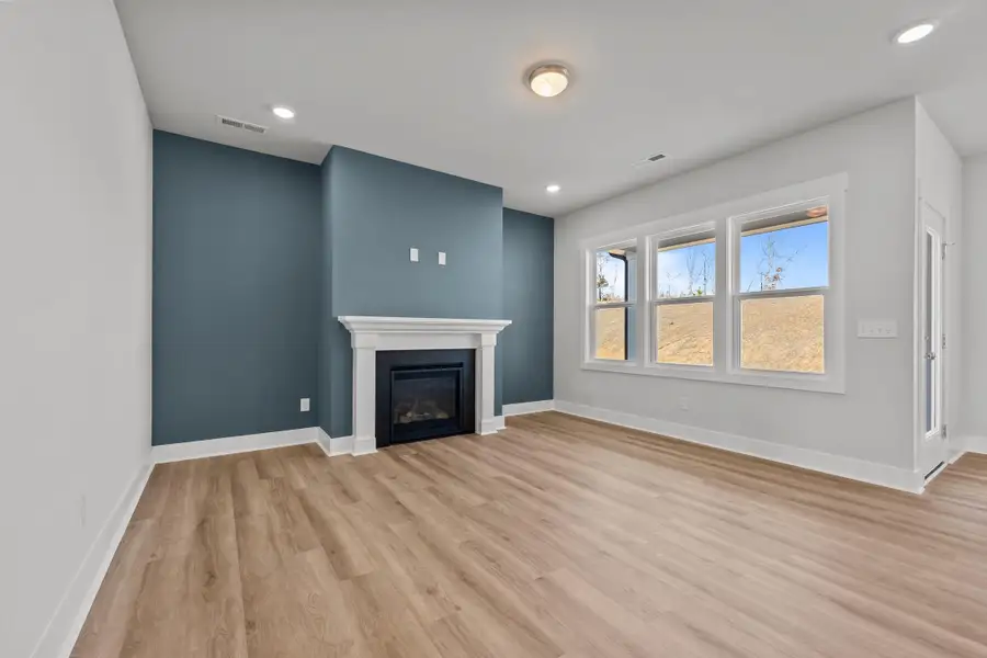 Representative unfurnished interior of a home built from the Raindrops on Roses by Garman Homes in McConnell Ridge, McLeansville (Image 9).