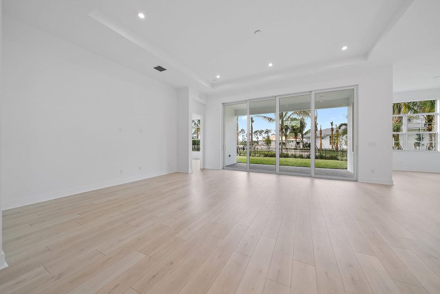 Spacious, unfurnished interior of a new home in L'Ambiance at Avenir, Palm Beach Gardens (Image 43).
