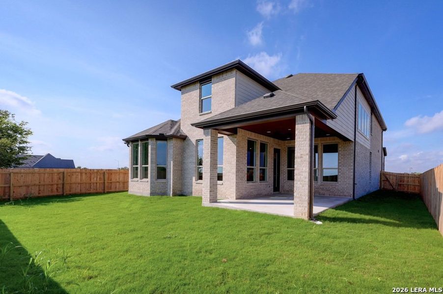 Exterior details and patio area of a home in Venado Crossing, Cibolo (Image 2).
